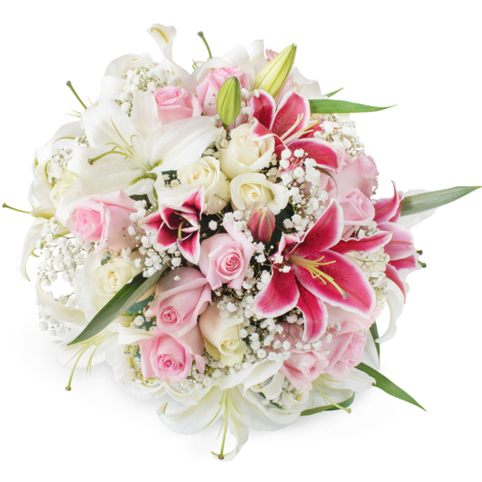 A sumptuous, hand-tied bouquet is displayed against a spotless white background, showcasing an artful mix of white and pink flowers arranged in a perfectly rounded shape. Large white lilies form the structural focal points, their trumpet blooms open wide with gently ruffled edges and soft green pistils reaching outward, while a few unopened buds promise days of continued beauty. Between these lilies, clusters of roses in tender blush pink and creamy ivory are packed tightly, some petals still wrapped protectively around their centres, others fully open in swirling, velvety layers that invite the eye to linger. Punctuating the softer tones, vivid magenta Oriental lilies-reminiscent of classic Stargazer lilies-flare dramatically, their dark pink petals dusted with deeper speckles and framing bold yellow-orange anthers. Delicate white baby's breath is threaded throughout, its tiny star-shaped blooms creating a misty, romantic veil that softens transitions between larger flowers and adds an airy lightness. Subtle flashes of glossy green foliage peep from beneath the blossoms, offering contrast without disrupting the harmonious, domed outline. The bright, even studio lighting enhances every hue and texture, much like the clear daylight that filters through Clerkenwell's brick-fronted townhouses, giving the impression of freshly cut stems ready for same-day delivery. This bouquet feels perfectly suited to significant life moments in Clerkenwell-perhaps a wedding celebration in a local townhouse, an anniversary dinner near Farringdon, or an elegant thank-you gift arriving at a design studio off Exmouth Market-conveying love, admiration, and quietly confident joy.