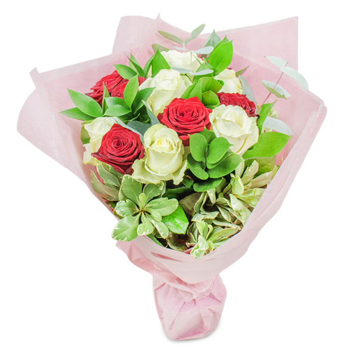 Captured in luminous clarity against a fresh white backdrop, this exquisite bouquet from Clerkenwell features about twenty radiant roses: ten in sumptuous ruby red, ten in delicate, creamy white. Each rose unfurls in perfect symmetry, their petals hinting at the thoughtful timing of an early morning cut from a skilled local florist. The composition is rich with verdant greenery-deep green ruscus forming a solid, elegant base; lighter, slightly waxy leaves infusing the arrangement with textural depth; airy sprigs of silvery eucalyptus weaving fresh movement through the bouquet; and highlights of variegated foliage with cream accents, echoing Clerkenwell's patchwork of historic and modern architecture. Enveloped in multiple, softly layered sheets of pastel pink paper, the whole display is tied with quiet refinement, a nod to the timeless romance that weaves through the area's bustling markets and intimate courtyards. This arrangement resonates with both vibrant celebration and refined sentiment-an ideal emblem for love, gratitude, or pivotal life moments. Whether gracing a dining table on St John's Square or marking a thoughtful delivery from Clerkenwell Flowers, it is an artful example of floristry and a heartfelt transmission of joy.