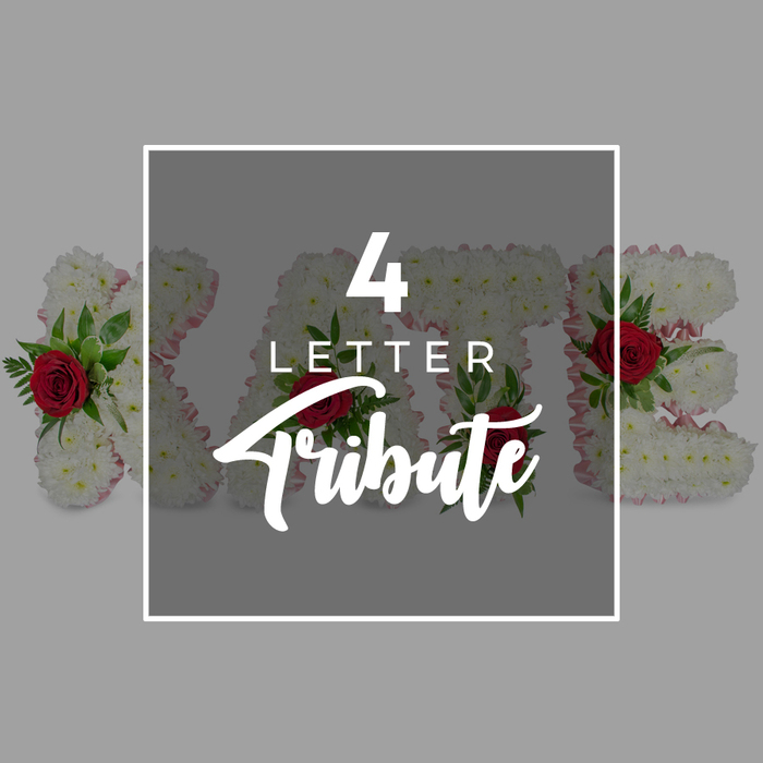 A refined promotional composition illustrates a personalised four-letter funeral tribute, the kind of carefully planned design often chosen by families in Clerkenwell who wish to spell out a name or cherished word in flowers. Dominating the scene, yet partially veiled, are four substantial floral letters arranged in a row, their shapes sculpted from a dense carpet of white chrysanthemums. Each bloom is small and neatly ruffled, combining to create a plush, almost pillow-like texture that feels soft even in a photograph. The sides of the letters are trimmed with a slim band of blush pink ribbon or fabric, which subtly frames the white flowers and lends a tender, comforting glow to the edges. Positioned thoughtfully among the chrysanthemums are clusters of deep red roses, their petals unfurling in velvety layers, accompanied by glossy green foliage that spills gently over the contours. These touches of red and green punctuate the white surface, suggesting love, life, and continuity amidst loss. Over the central section of the letters sits a dark, semi-transparent grey square, bordered by a neat white outline that contrasts with the lighter grey background. Though the overlay softens the details beneath, you can still discern the round shapes of roses and the leafy greenery pressing up against the veil of grey. Across this central block, crisp white text announces 4 LETTER in a clear, modern style, with the word Tribute below in a graceful, script-like font evocative of personal handwriting. The overall mood is respectful and composed, evoking the kind of bespoke floral lettering a local Clerkenwell florist might prepare for funeral corteges passing through nearby streets or quiet remembrance gatherings after a service.