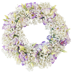 A thoughtfully arranged circular wreath of fresh flowers is shown floating against a pure white background, its details crisp and undistracted. The structure is built from an abundance of white Baby's Breath, the countless tiny blossoms forming a feathery halo that looks almost like soft morning mist. Woven gently through this cloud of white are generous stems of Lisianthus, their petals unfolding in delicate, ruffled layers. Each Lisianthus bloom is predominantly white, but the petal edges are traced with shades of lavender and violet, creating a subtle wash of colour that ripples around the ring. Some of the flowers open wide, revealing their darker centres, while others remain partially closed, their buds pale green with a whisper of cream and yellow, promising future bloom. The open centre of the wreath is clean and uncluttered, emphasizing the classic ring shape-a quiet symbol of eternity and unbroken love. The overall impression is peaceful and refined, with the cool white and gentle purple tones working together to convey calm support and sincere condolence. As a local Clerkenwell florist, I often imagine a design like this resting at a funeral service in one of our nearby churches or being laid at a memorial near Clerkenwell Green, where families gather to say goodbye. The arrangement's light, airy texture and elegant colour palette make it a fitting tribute for funeral wreath delivery throughout EC1, offering a visual expression of remembrance, solace, and enduring connection.