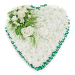 Serene heart-shaped condolence arrangement composed almost entirely of tightly packed white chrysanthemums, their rounded petals forming a seamless, textured blanket that covers the whole heart with a soft, pillowy effect. The flowers are uniform in tone, a clean, snowy white that suggests purity, respect, and a peaceful farewell, the kind of tribute lovingly crafted in a Clerkenwell flower shop for local families saying goodbye. Framing the heart is a bold emerald green satin ribbon, expertly pleated into a ruffled edge that traces every curve and point of the shape. Its rich colour and gentle sheen add a refined touch, making the heart's outline visually crisp without disturbing the calmness of the white blooms. In the upper left portion of the heart, a beautiful accent cluster draws gentle focus. Two open white roses sit at its centre, their creamy petals unfolding in layered spirals. Around them, smaller white blossoms-similar to freesias-along with a few dainty buds, create a sense of delicacy and natural growth. Lush green foliage, both broad-leafed and finely feathered, surrounds and supports these focal flowers, with a few fronds gracefully extending over the chrysanthemum base. The arrangement is photographed on a pure white background, highlighting every petal, leaf, and pleat of ribbon without distraction. This heart tribute feels ideal for placing beside the coffin or at the front of a chapel during a funeral or memorial service in Clerkenwell, perhaps near St John's Square or along nearby Farringdon Road, providing a quiet, dignified expression of love, remembrance, and sympathy.