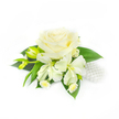 A meticulously crafted corsage arranged on a pure white field, this piece reads as an emblem of understated bridal elegance. At its centre sits a fully opened creamy white rose, its velvety petals layered from a tightly furled heart to gently unfurling outer edges that catch soft, studio-like light. The rose's creamy tone is complemented by two lily-like alstroemeria blooms tucked slightly beneath it, their slender, ivory petals lending a delicate, airy line to the composition. To the left, two elongated green buds remain closed, hinting at fresh growth and a promise of more blooms to come, while a spray of tiny white daisy-like flowers with pale yellow centres nestles low, offering fine, playful texture against the larger forms.
Rich, deep green foliage-broad, smooth leaves-frames and lifts the florals, supplying a cool contrast that makes the whites read as luminous and pure. On the right, a small cluster of lustrous white pearls is nestled among leaves and petals, catching light like a whisper of classic jewellery and suggesting this piece's use as a wrist corsage or a refined bridal accessory. The arrangement smells faintly of fresh, green stems and soft rose perfume; it feels cool and layered to the touch. As a local Clerkenwell choice for weddings, proms or formal gatherings near Exmouth Market and St John's Square, this corsage embodies calm confidence, timeless purity, and careful craftsmanship designed to sit gracefully against a wrist or lapel.